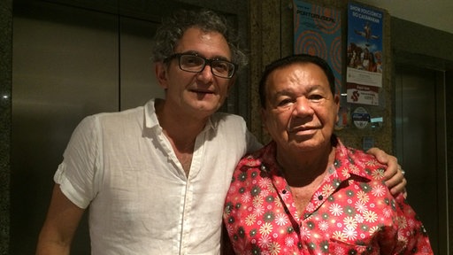 Moderator Francis Gay mit Mestre Vieira