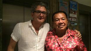 Moderator Francis Gay mit Mestre Vieira