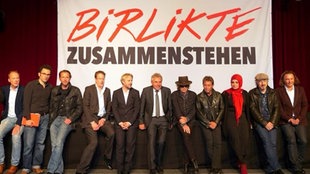 Gruppenfoto des Aktionsbündnisses "Birlikte-Zusammenstehen"